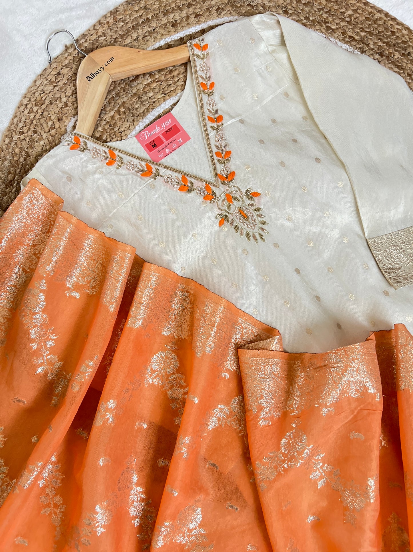 Beautiful ethnic wear with golden work in silk material