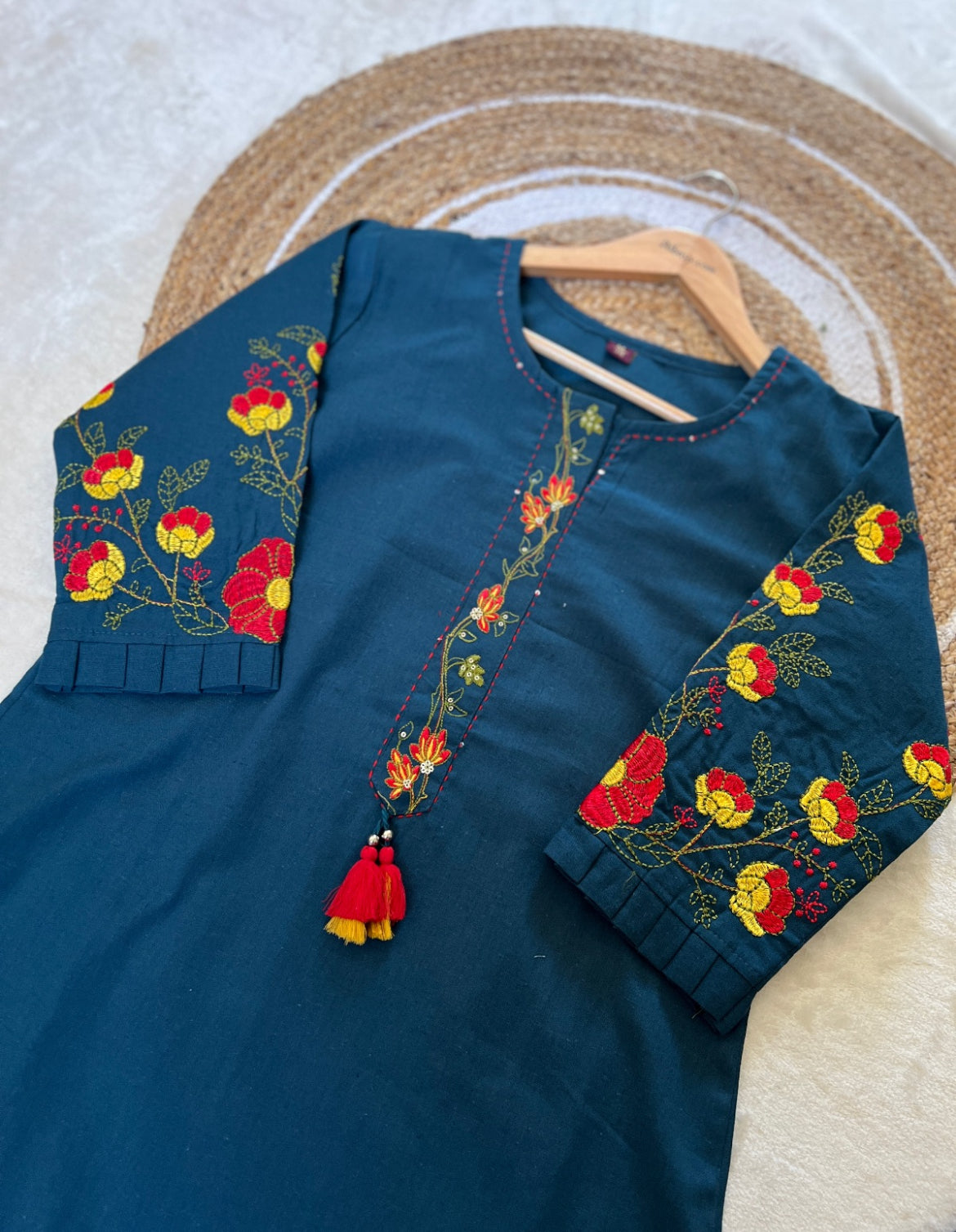 Beautiful dress in khadi cotton with embroidery work