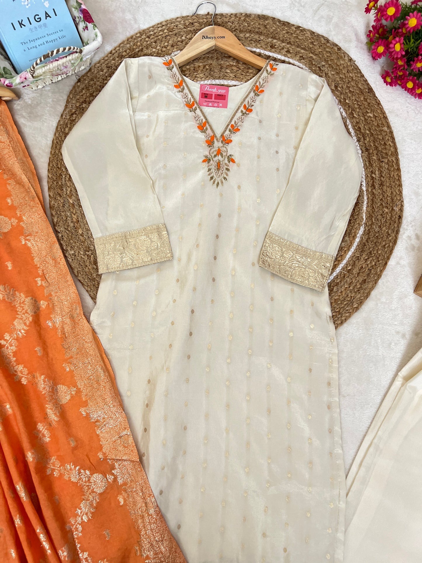 Beautiful ethnic wear with golden work in silk material