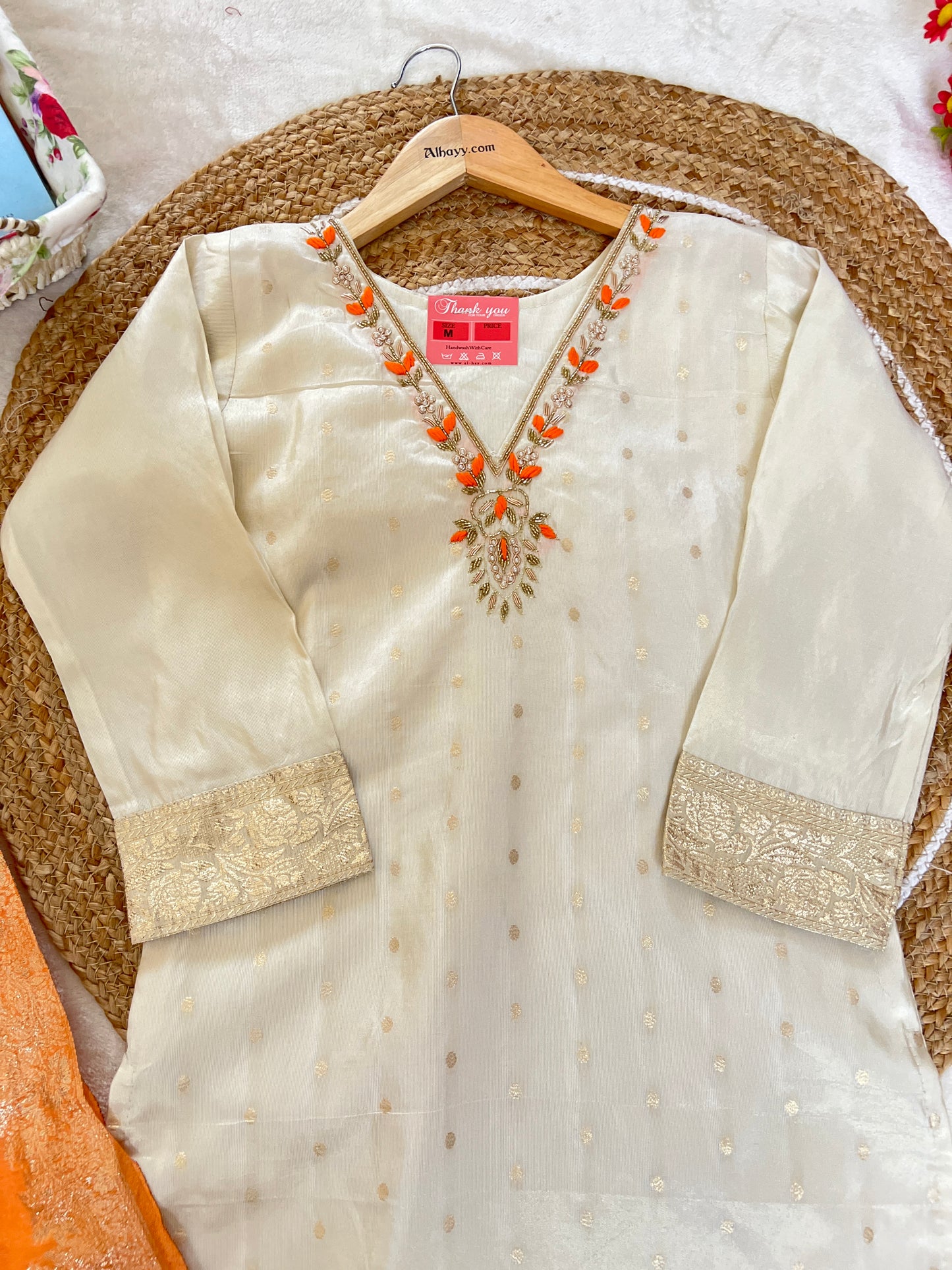 Beautiful ethnic wear with golden work in silk material