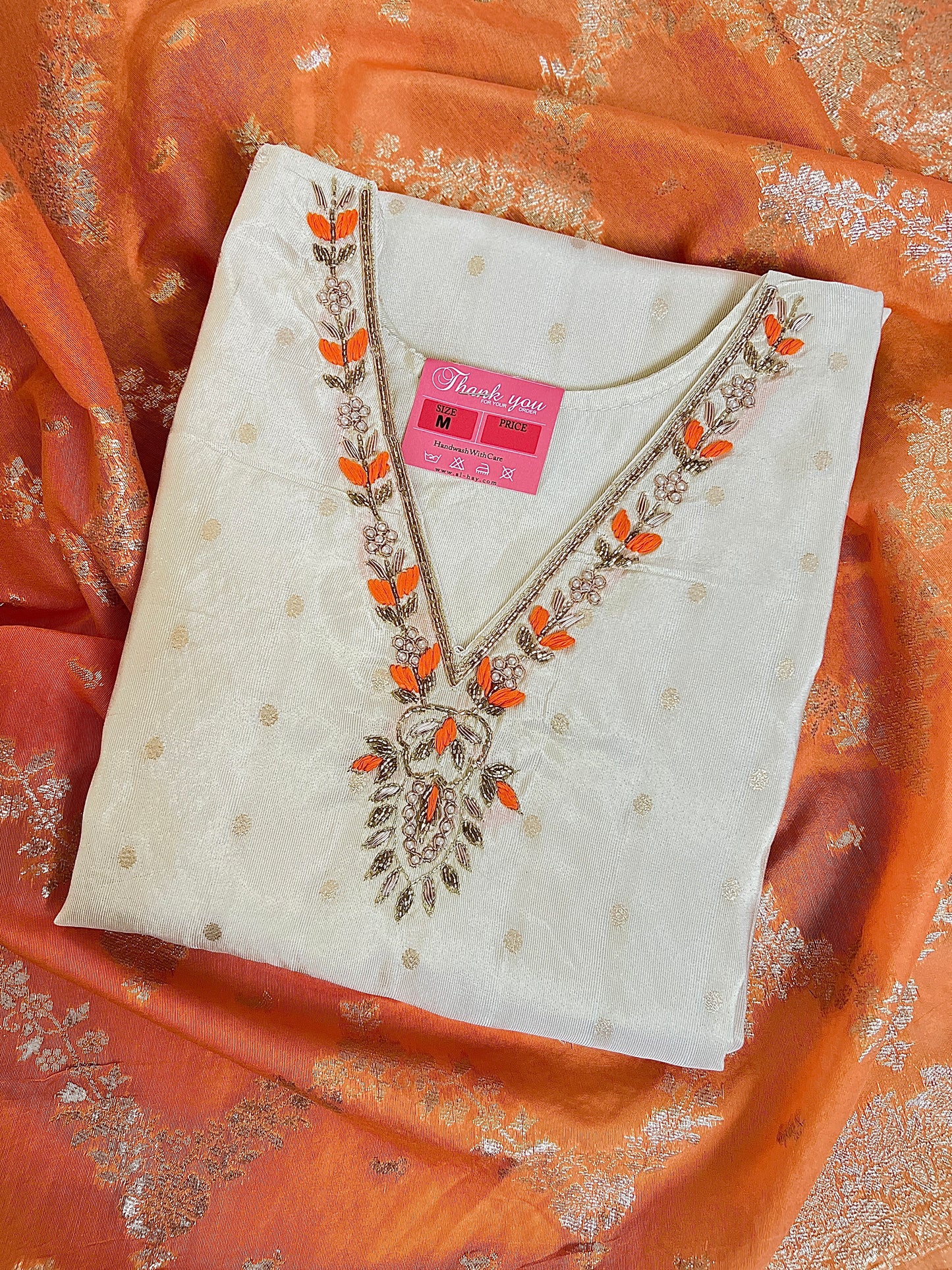 Beautiful ethnic wear with golden work in silk material