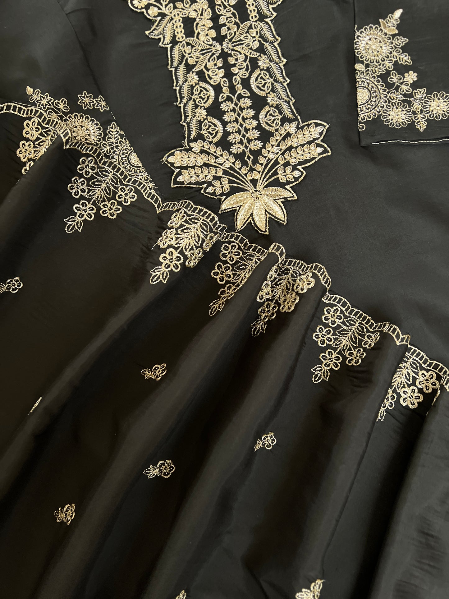 Beautiful Dress in Black with golden embroidery in Roman silk material