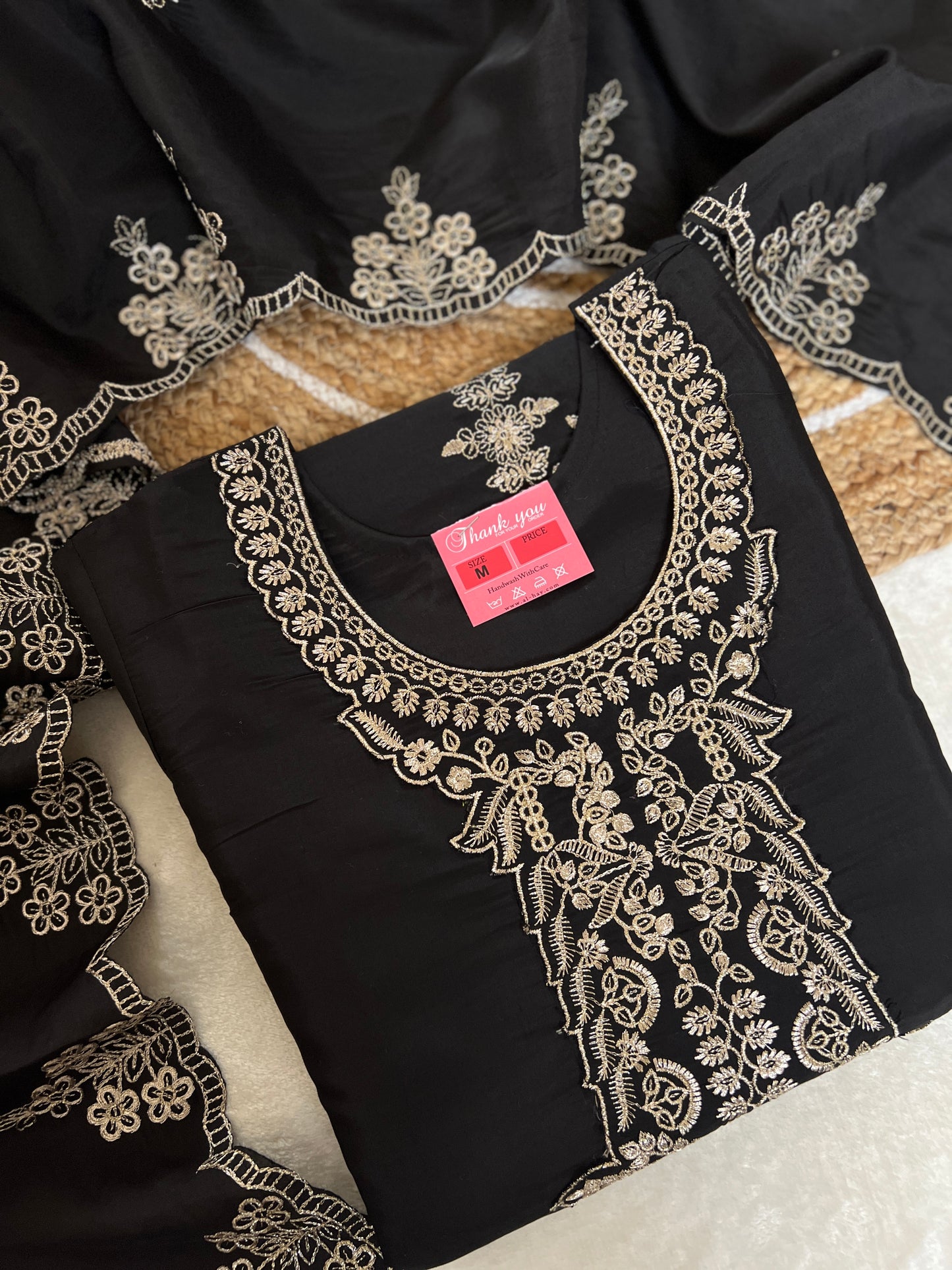 Beautiful Dress in Black with golden embroidery in Roman silk material