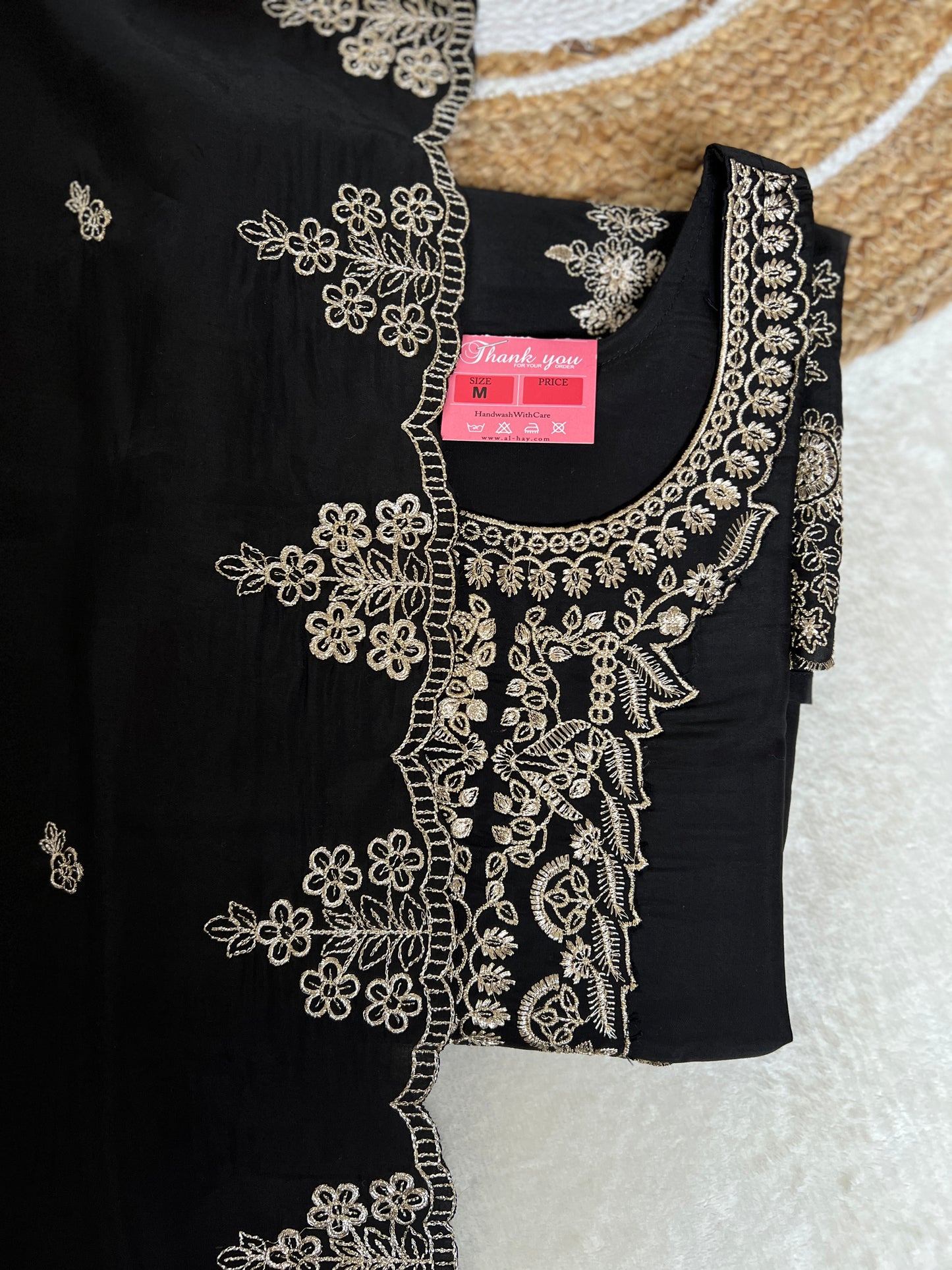 Beautiful Dress in Black with golden embroidery in Roman silk material