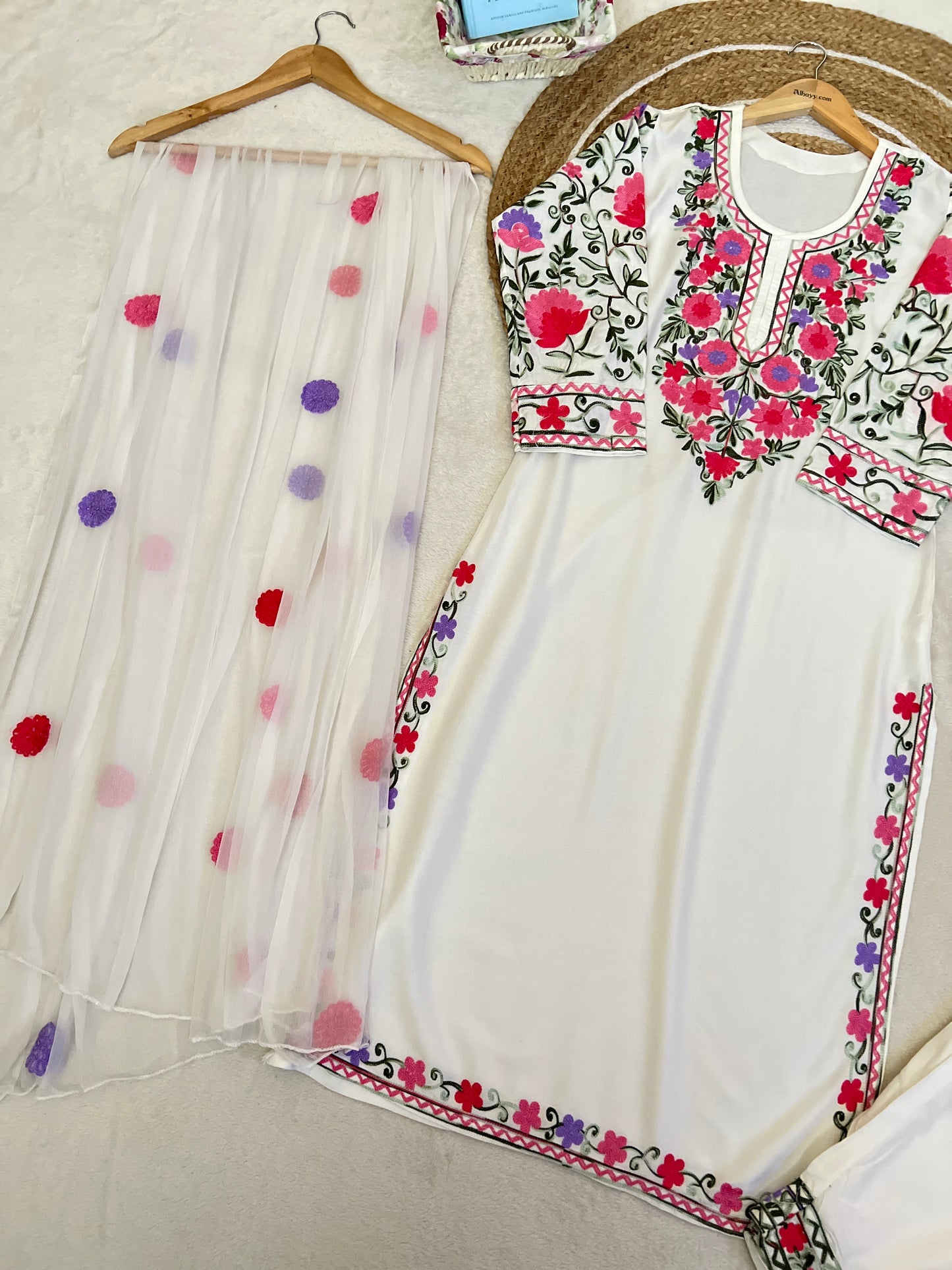 Beautiful dress kashmiri style with full embroidery and havy rayon material