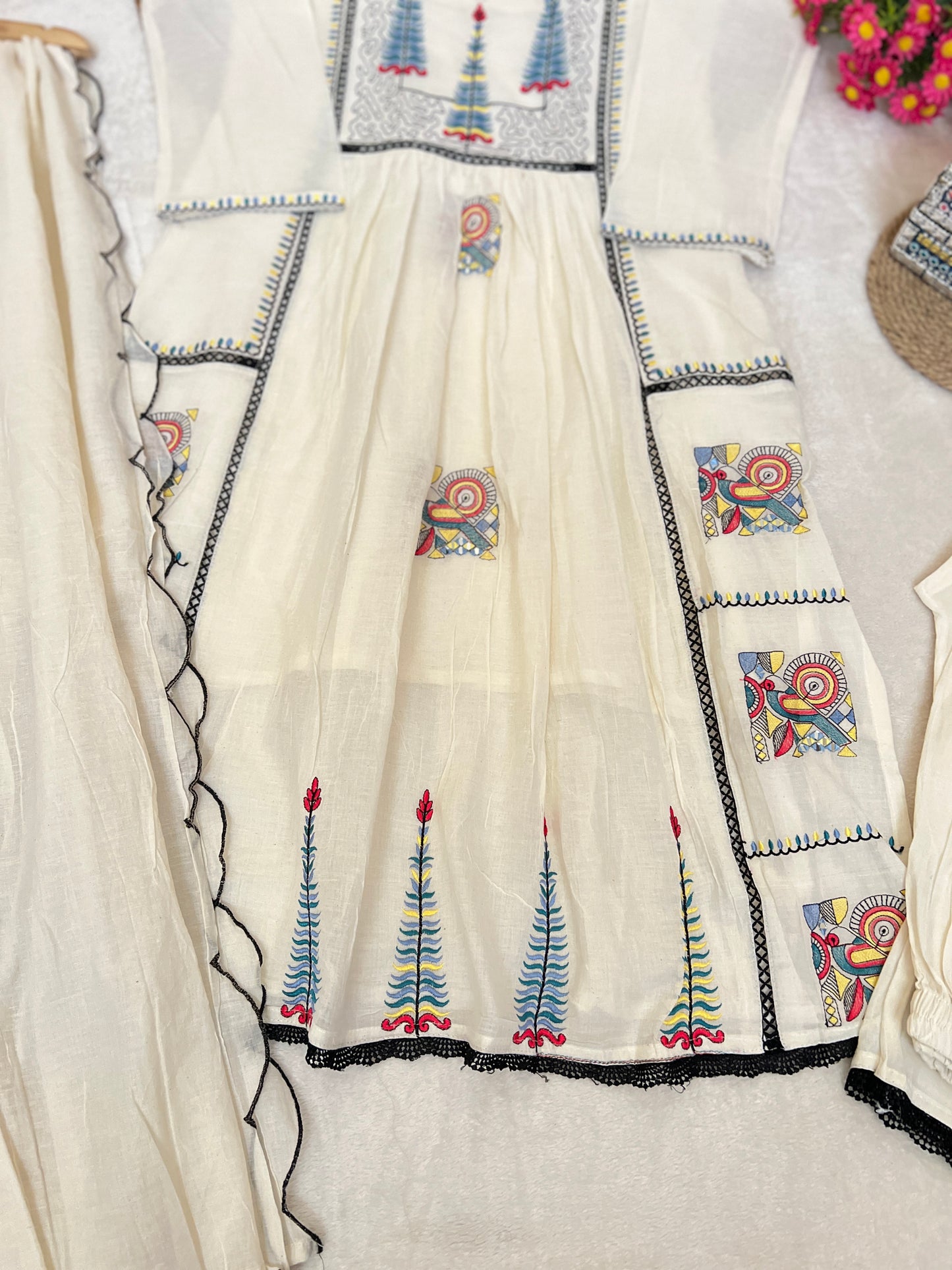 Beautiful dress in cotton with embroidery and mirror work