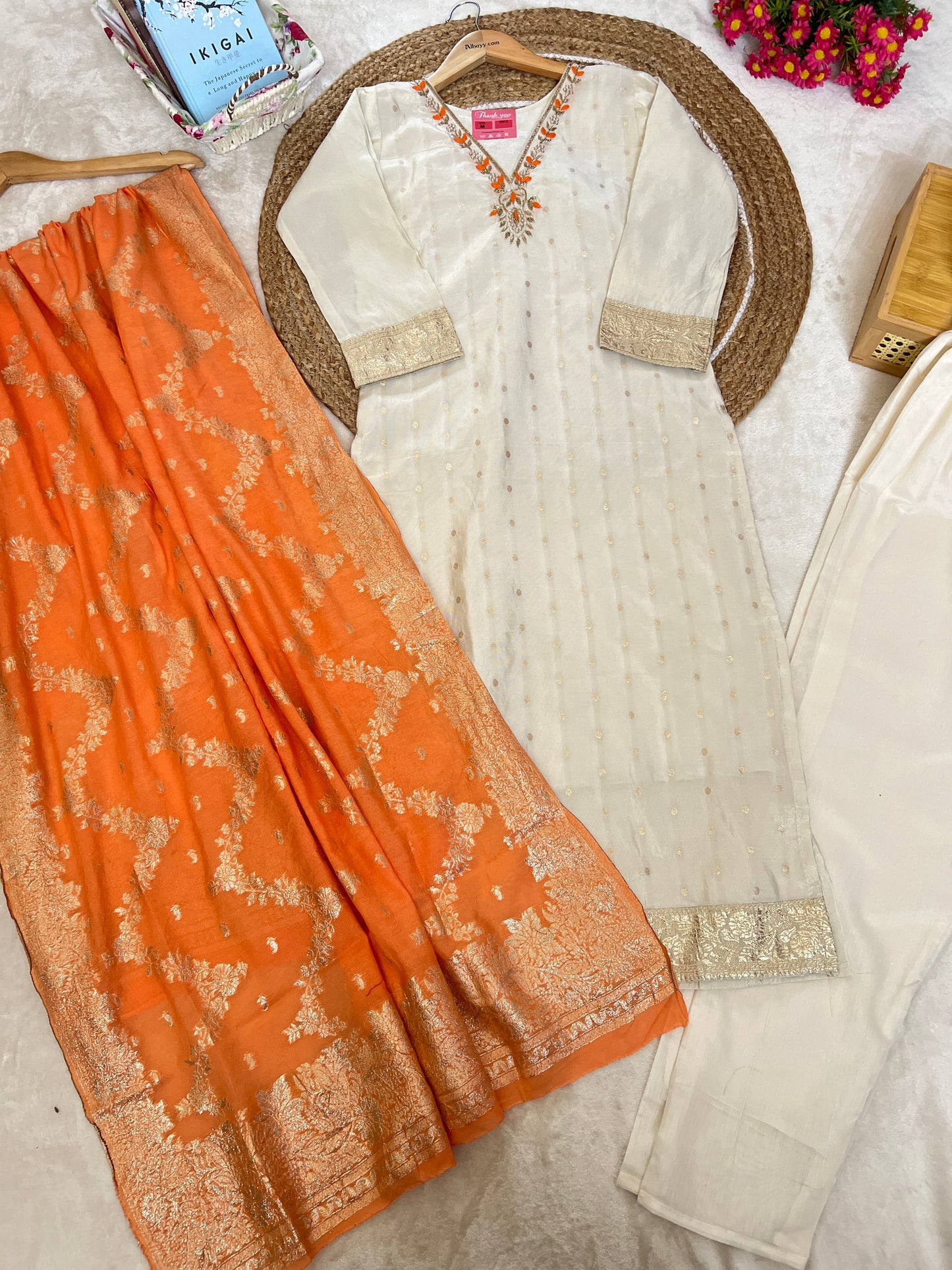 Beautiful ethnic wear with golden work in silk material