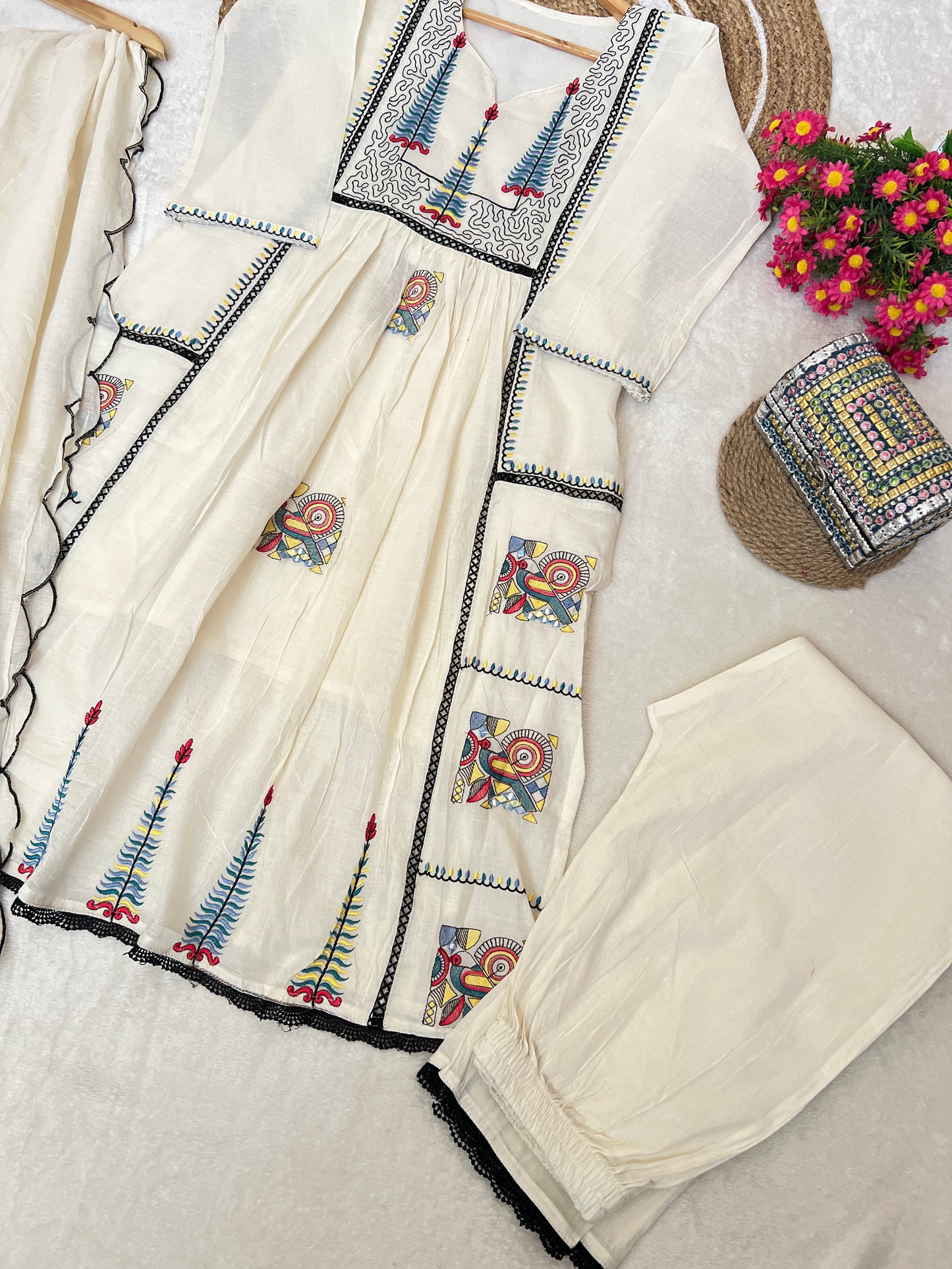 Beautiful dress in cotton with embroidery and mirror work