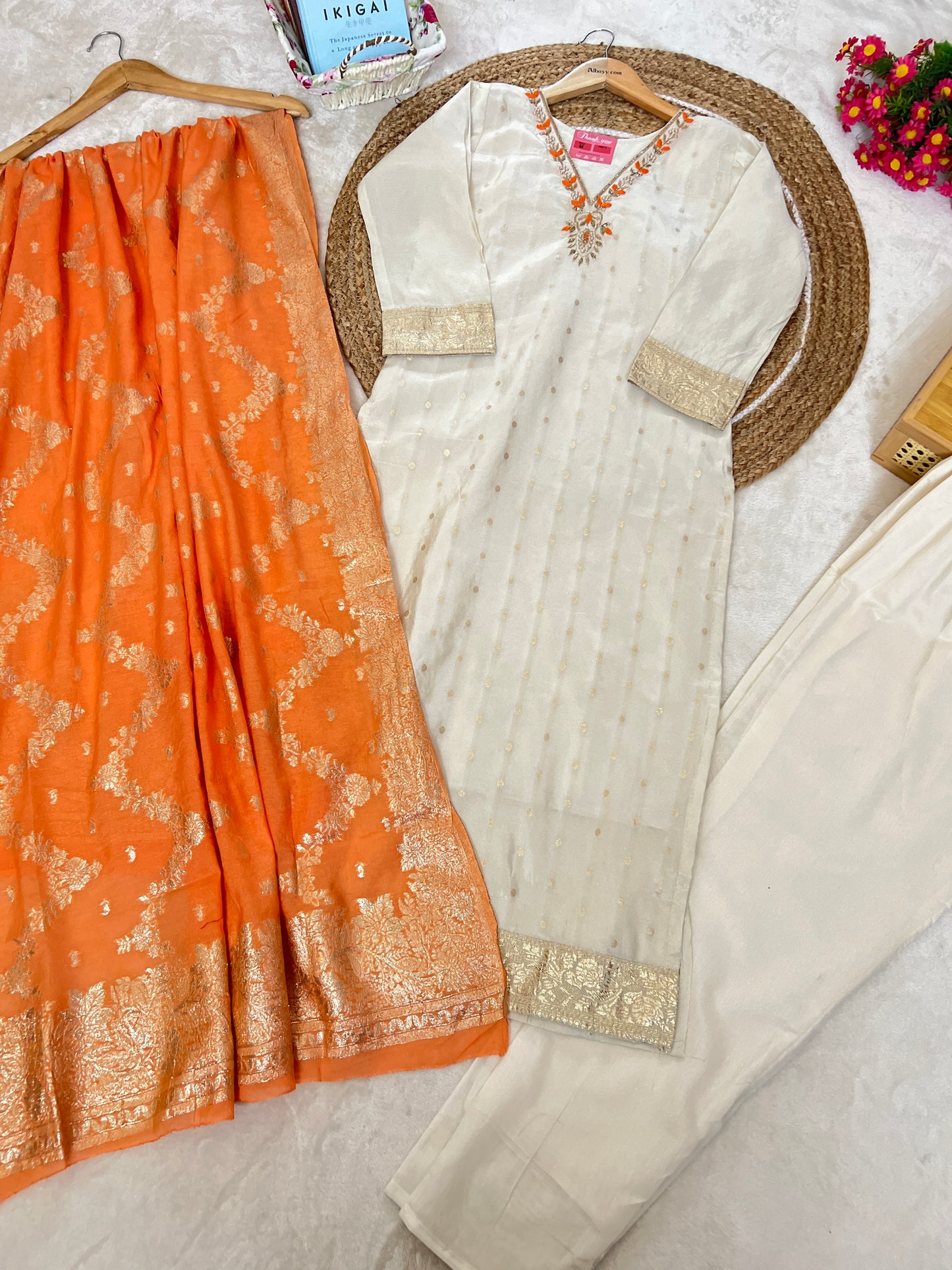 Beautiful ethnic wear with golden work in silk material