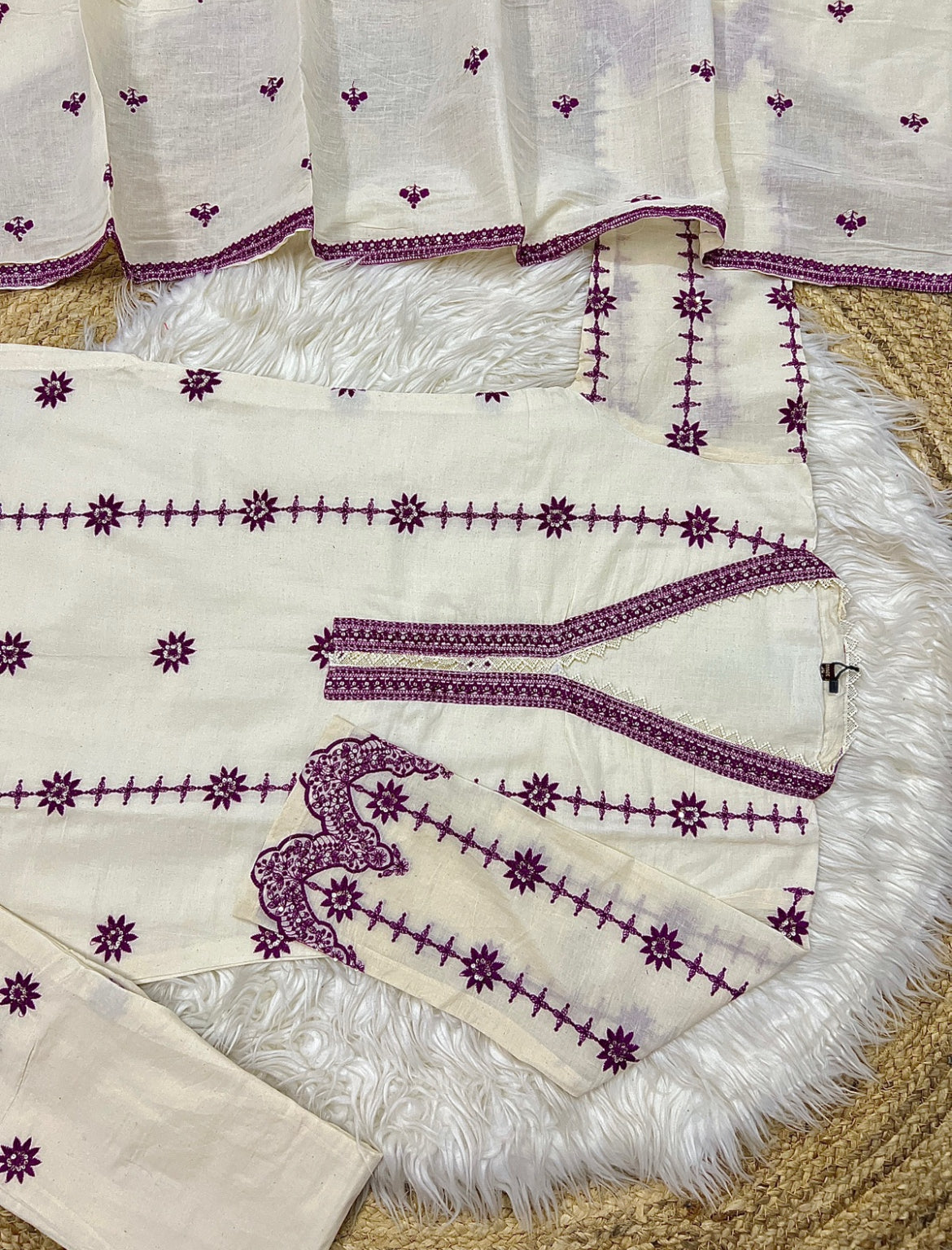 Beautiful dress in khadi cotton with full embroidery