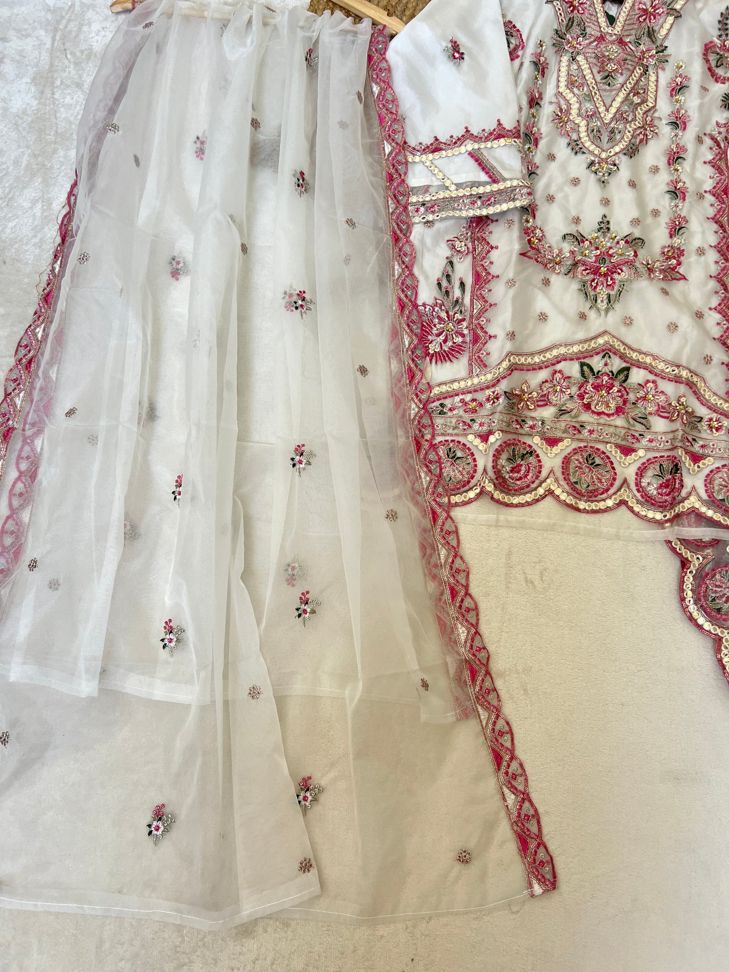 Premium suit set

Organza Material dress with full embroidery and sequins work CBRP2064