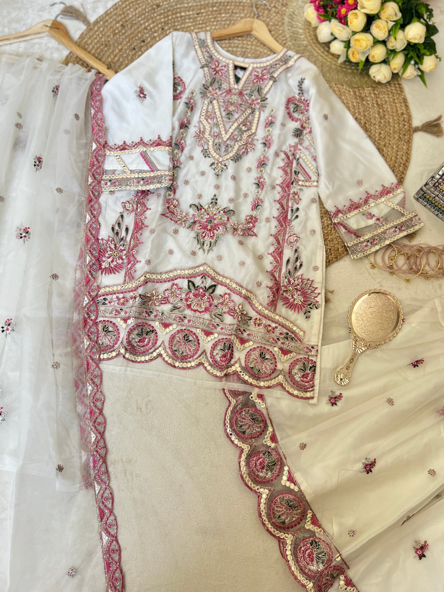 Premium suit set

Organza Material dress with full embroidery and sequins work CBRP2064