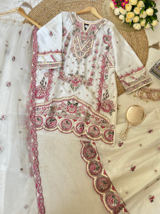 Premium suit set

Organza Material dress with full embroidery and sequins work CBRP2064