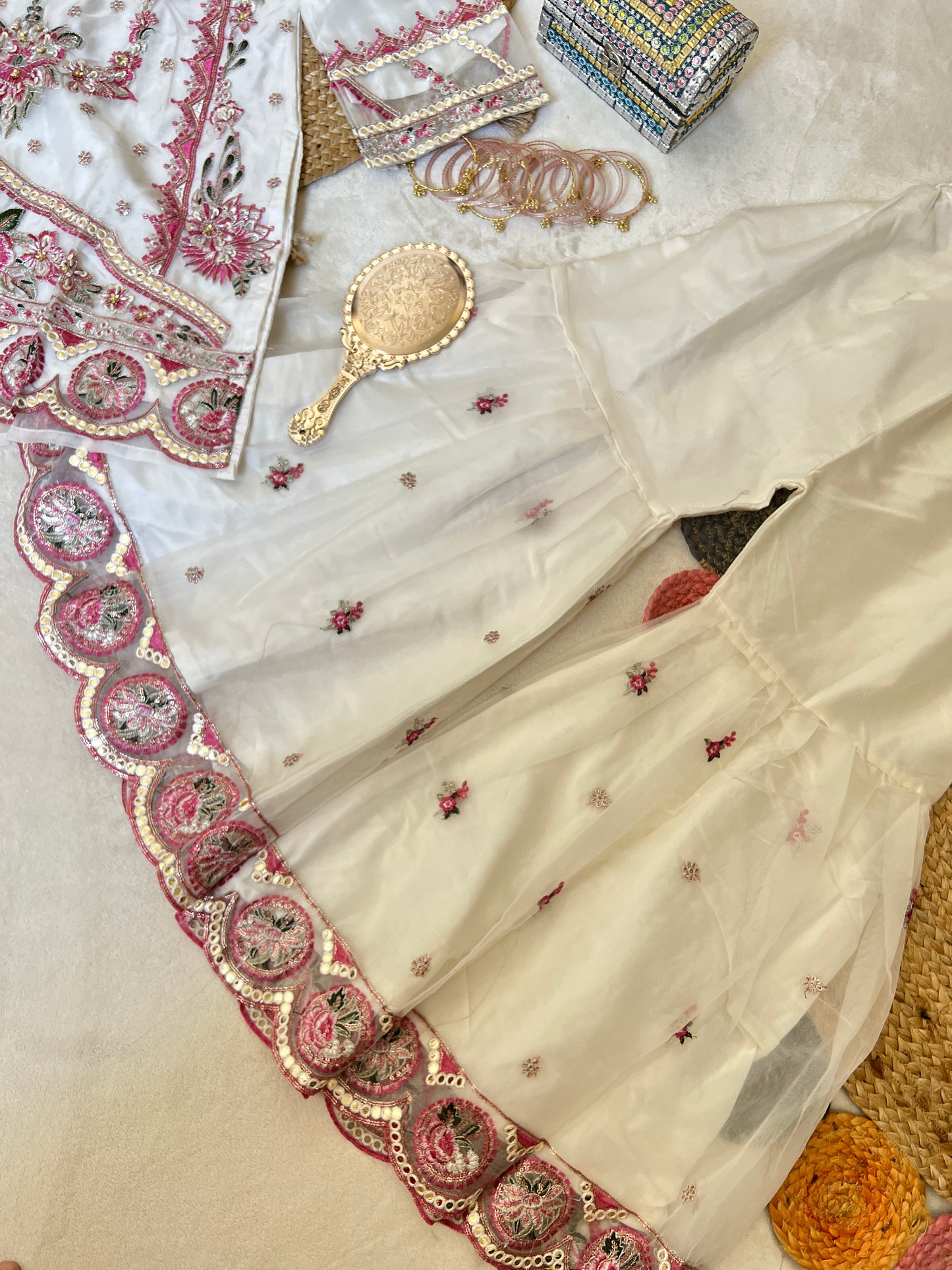 Premium suit set

Organza Material dress with full embroidery and sequins work CBRP2064