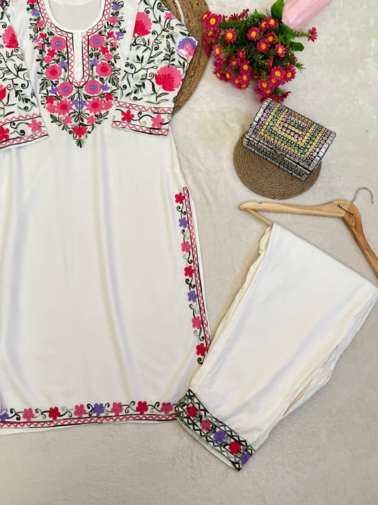 Beautiful dress kashmiri style with full embroidery and havy rayon material