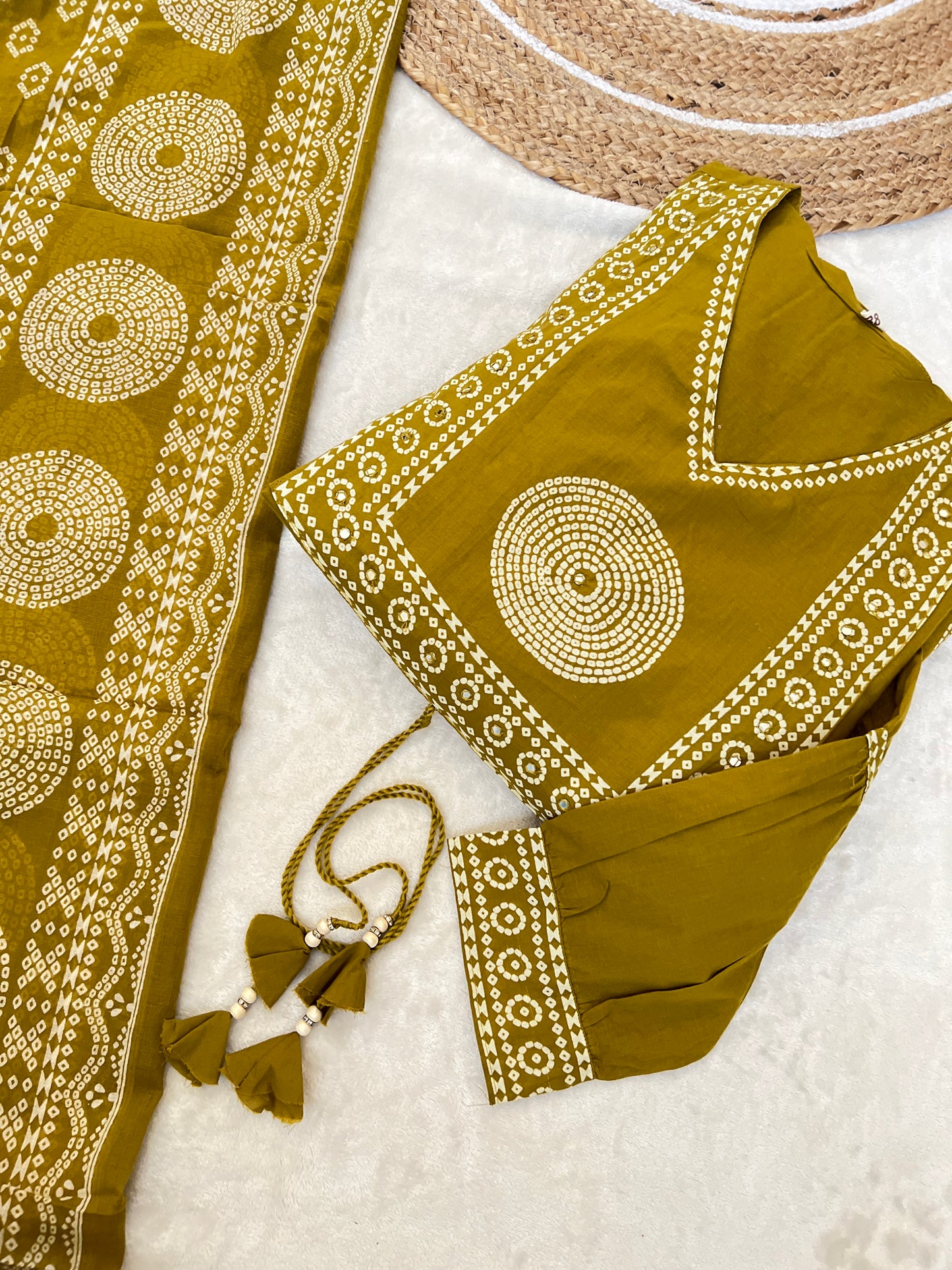 Premium cotton frock with tassels on th yoke portion balloon sleeves v neck