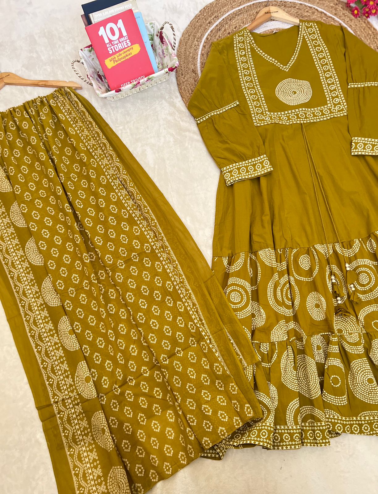 Premium cotton frock with tassels on th yoke portion balloon sleeves v neck